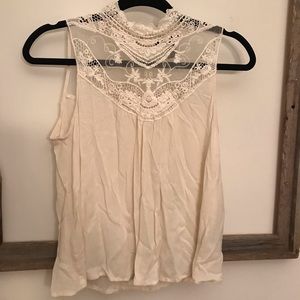 White lace topped sleeveless blouse